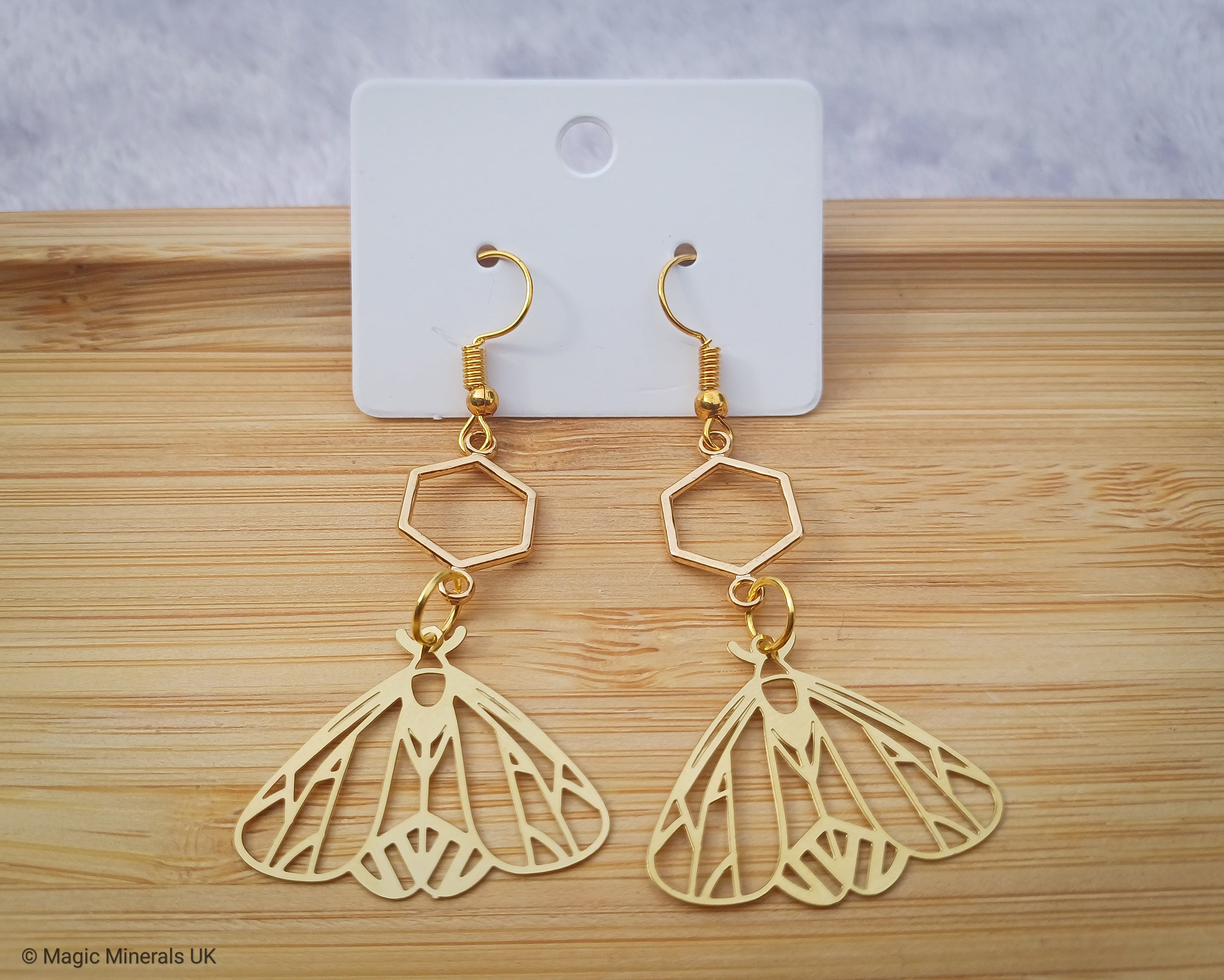 Gold moth earrings