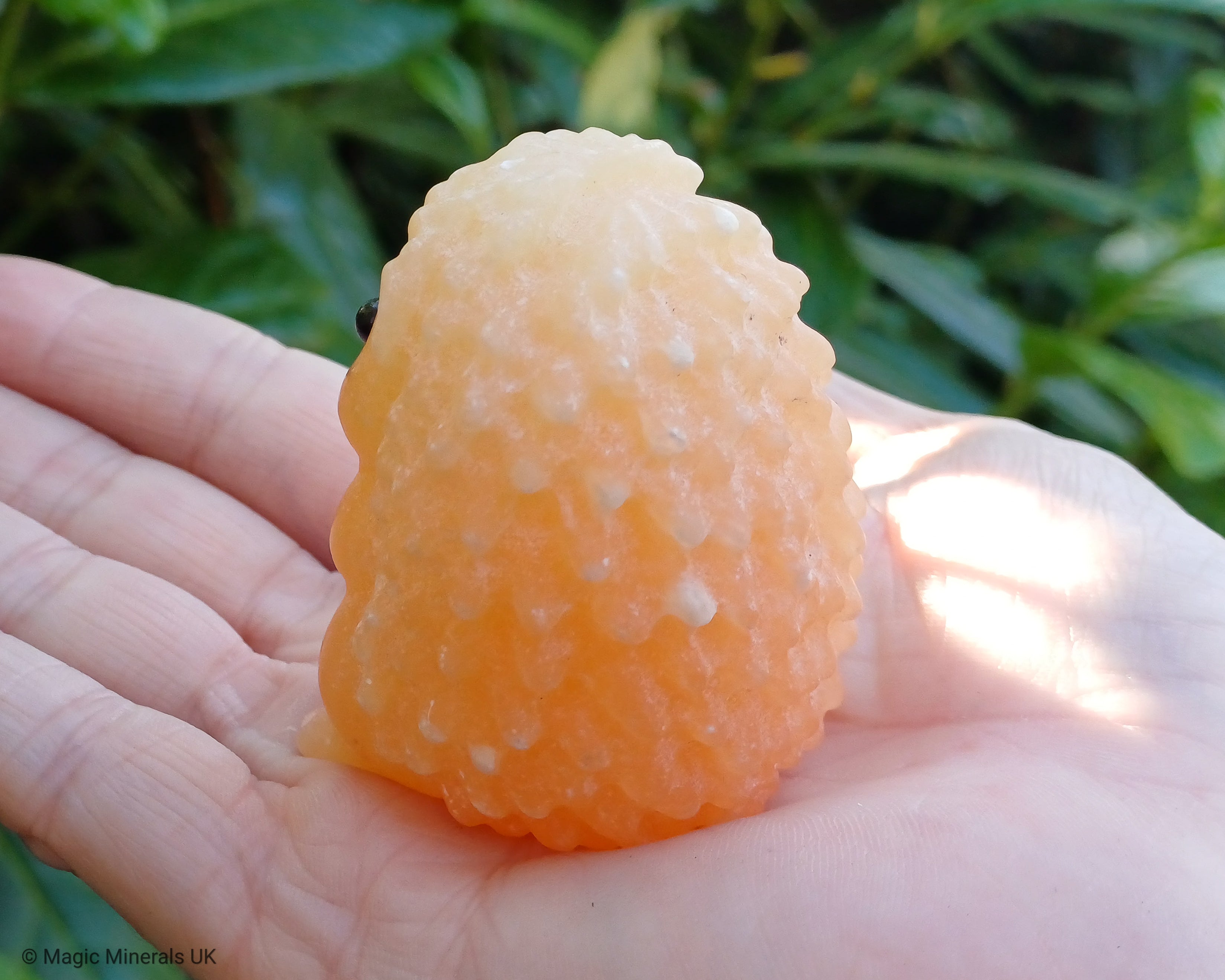 Orange calcite hedgehog crystal